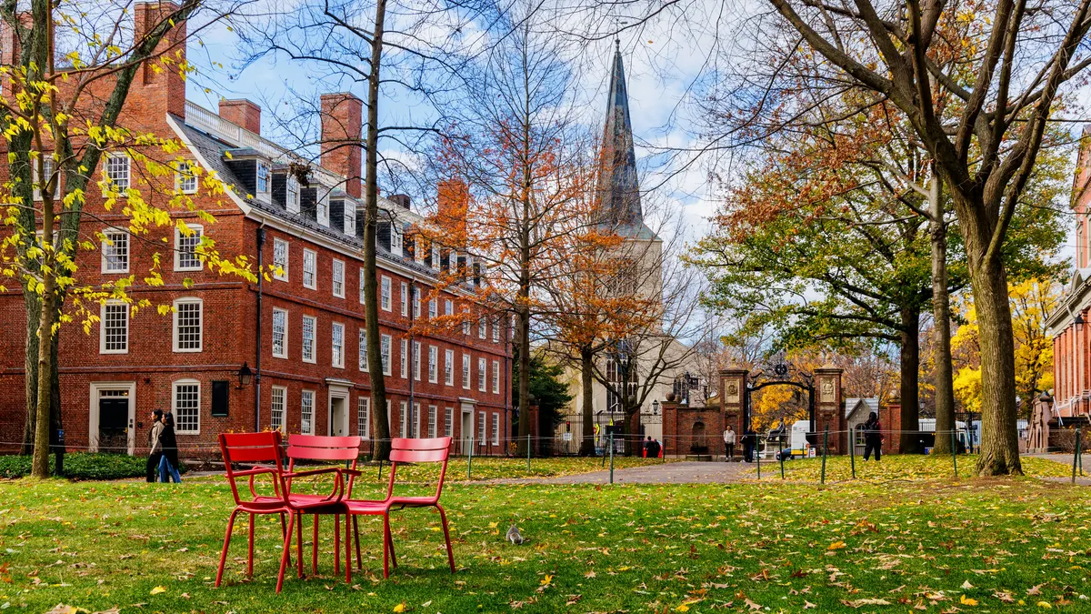 Harvard campus during daytime with students walking around
